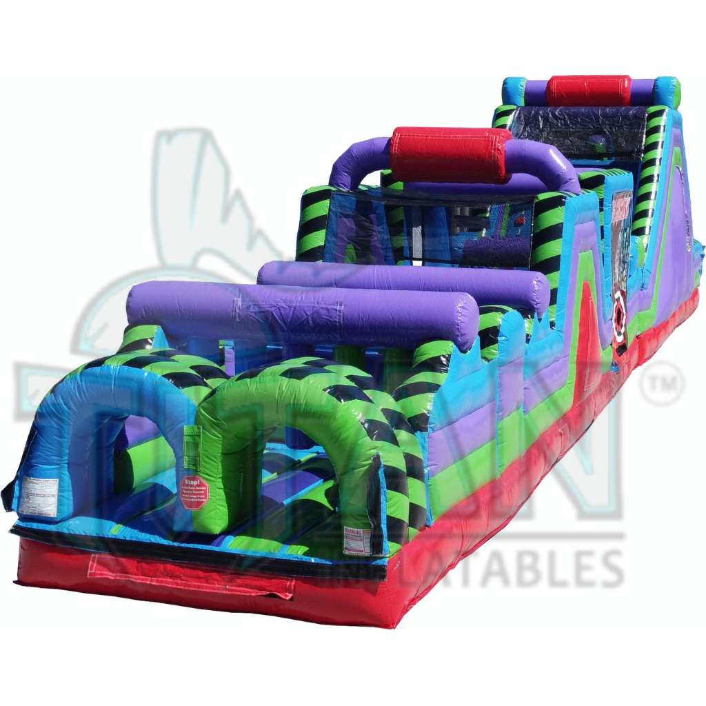  Angled facing left view of Titan inflatables multi colored 35 foot conqueror inflatable obstacle course attached with the 30 foot conqueror inflatable rock climb slide  